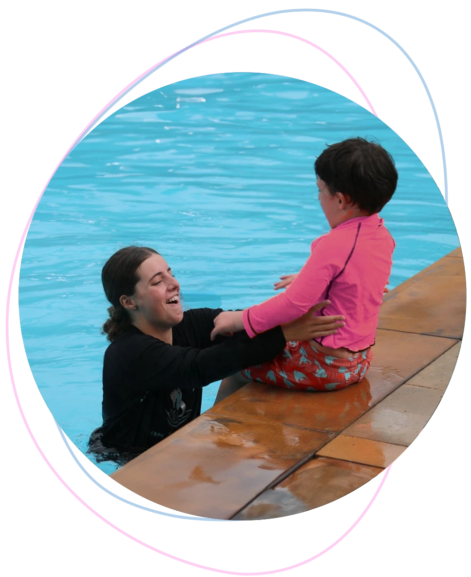 nereids-swim-teacher-encouraging-hesitant-child-water.webp